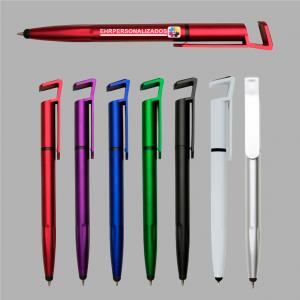 Caneta plástica com suporte para celular, ponteira touch screen e limpador de tela personalizada com nome e logo Plástico Área de Impressão = 0,7(L)cm x 3,5(C)cm Impressão frente   Após concluir o pagamento, clique em preencher formulário para anexar seu arquivo ou escrever seu texto